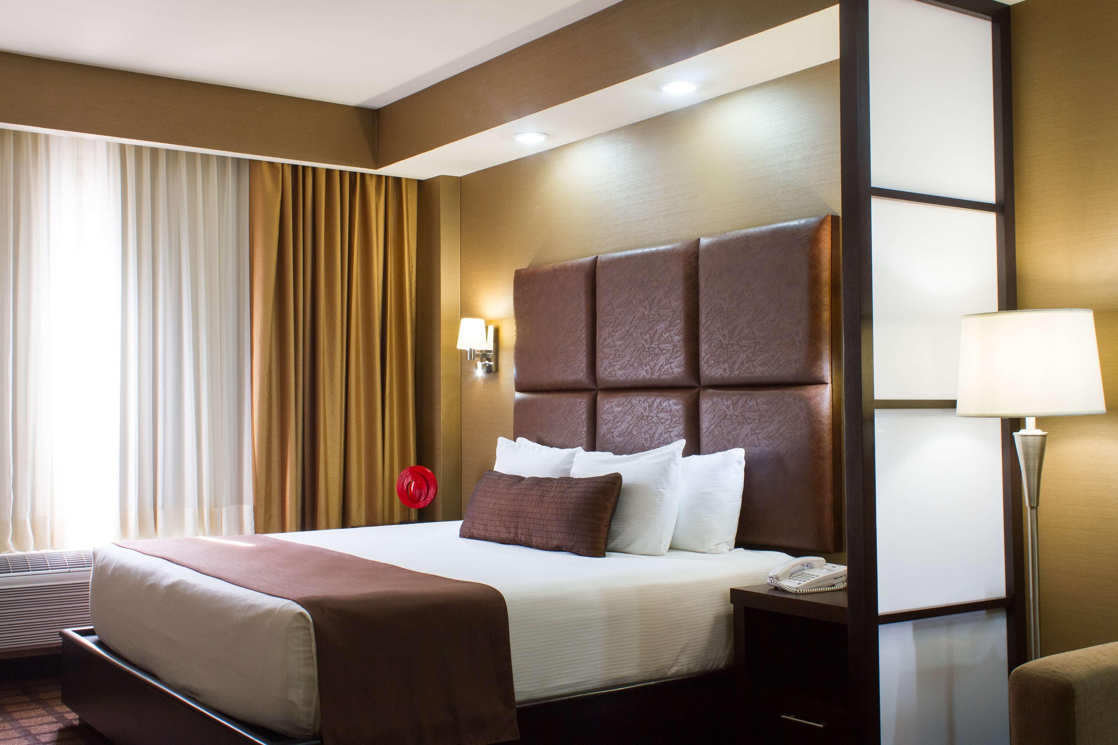 Best Western Premier Monterrey Aeropuerto Apodaca Bagian luar foto A typical hotel room