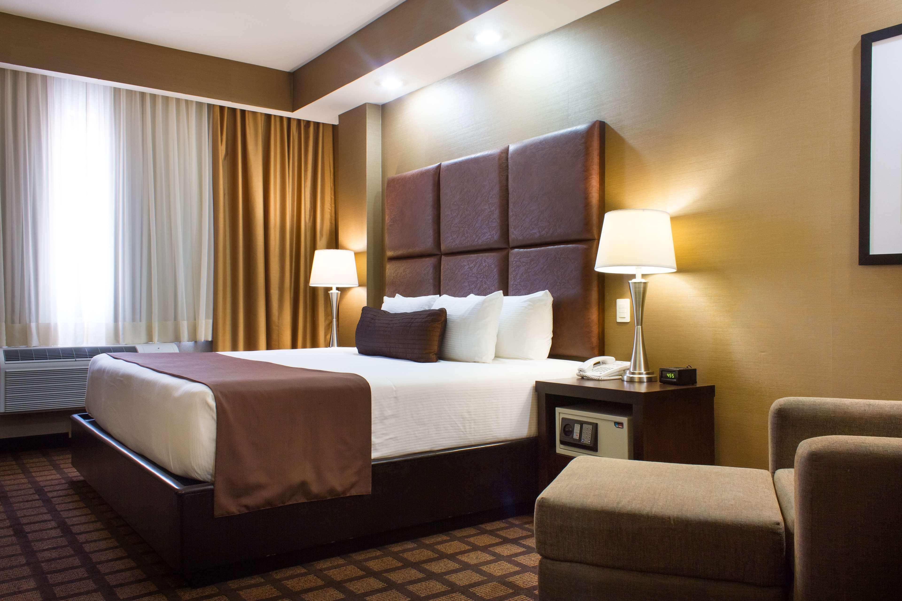 Best Western Premier Monterrey Aeropuerto Apodaca Bagian luar foto A typical hotel room