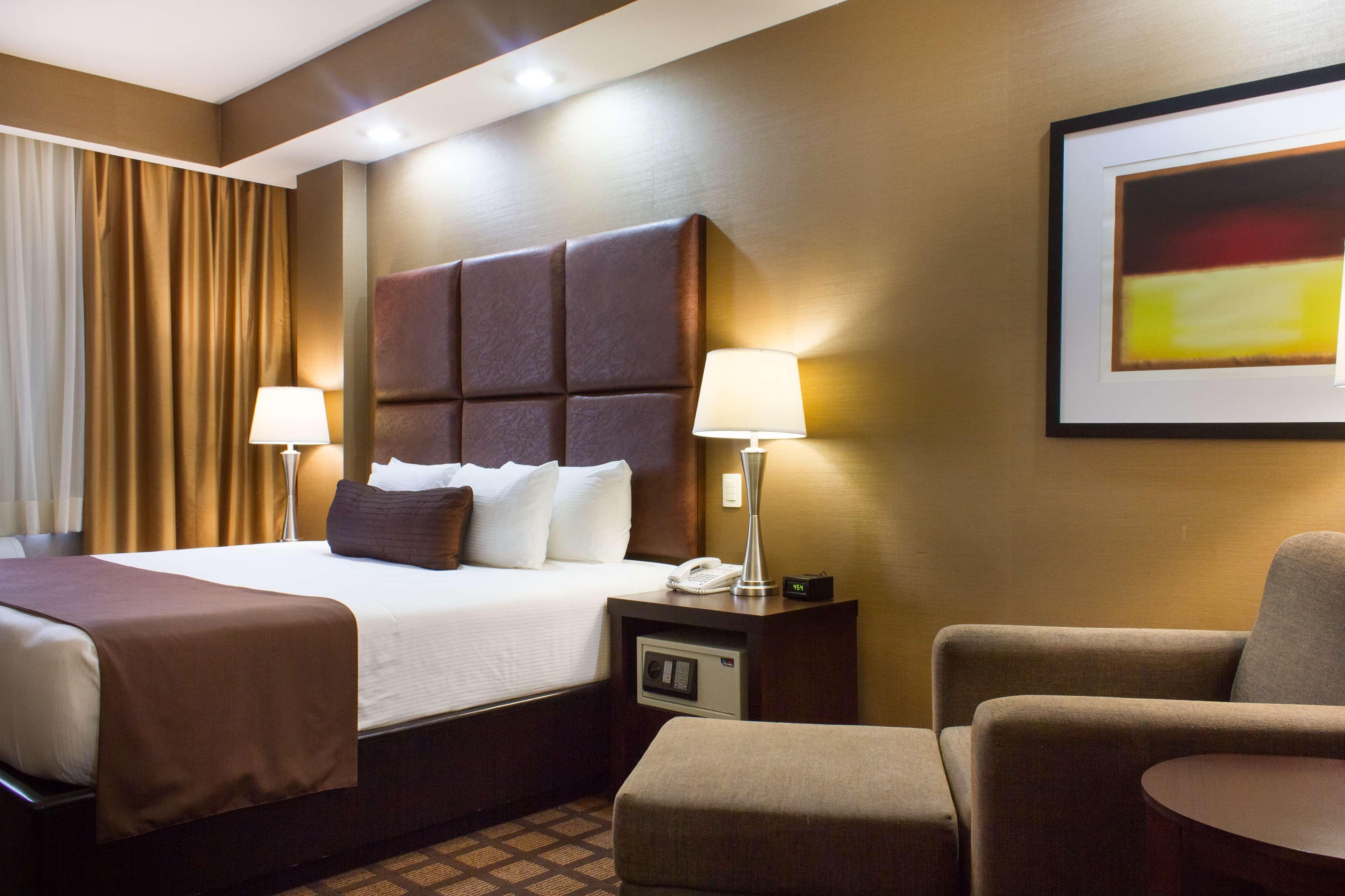 Best Western Premier Monterrey Aeropuerto Apodaca Bagian luar foto A typical room at the hotel
