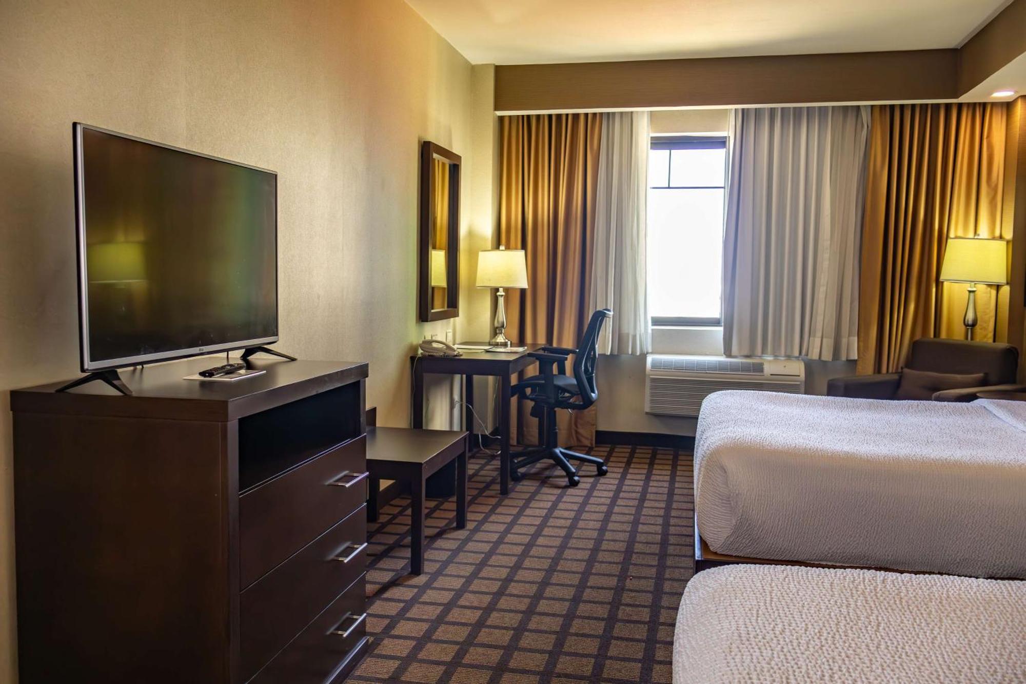 Best Western Premier Monterrey Aeropuerto Apodaca Bagian luar foto A typical room at the Hilton Garden Inn