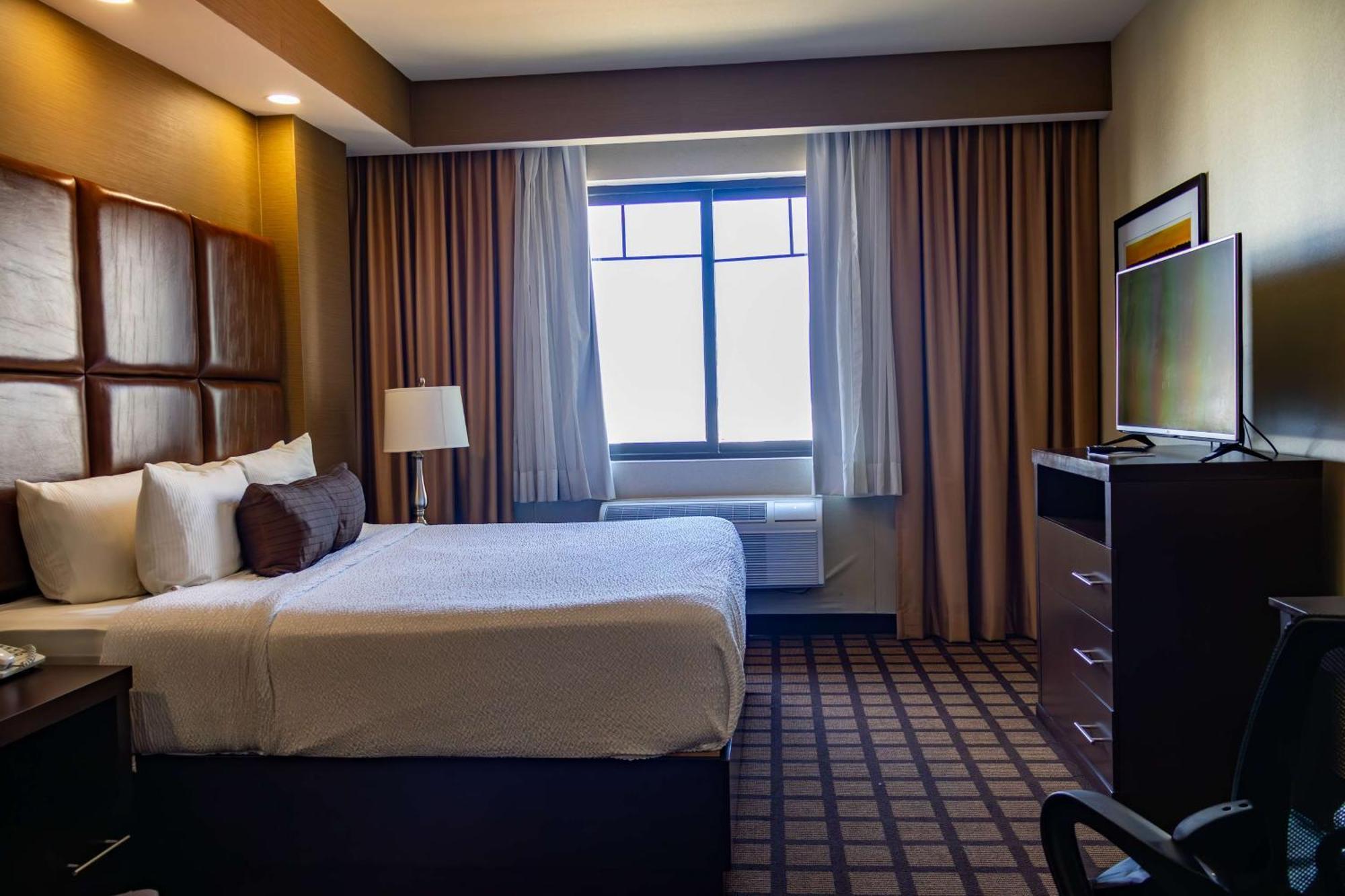 Best Western Premier Monterrey Aeropuerto Apodaca Bagian luar foto A typical bedroom in a typical hotel